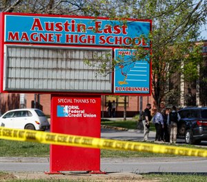 Knoxville police work the scene of a shooting at Austin-East Magnet High School Monday, April 12, 2021, in Knoxville, Tenn.