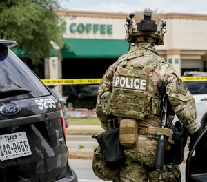 Austin police, SWAT and medical personnel respond to an active shooter situation located Great Hills Trail in Northwest Austin, Texas, on Sunday, April 18, 2021.