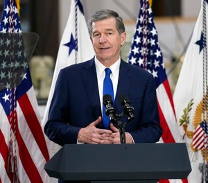 North Caroline Gov. Roy Cooper speaks at Guilford Technical Community College, Monday, April 19, 2021, in Jamestown, N.C.
