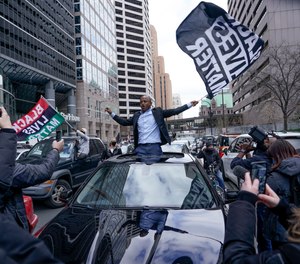 People rally outside the courthouse in Minneapolis on Tuesday, April 20, 2021, after the guilty verdicts were announced in the trial of former Minneapolis police officer Derek Chauvin in the death of George Floyd.