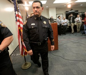 In this June 8, 2017, file photo, Harris County Sheriff Ed Gonzalez leaves a news conference, in Houston.