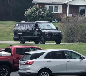 A tactical van from Caldwell County, North Carolina, sits on stand-by at a staging area in Boone, N.C., on Wednesday, April 28, 2021.