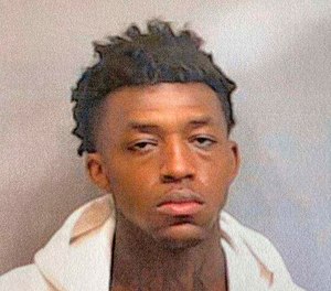 J'ssan Carlos Strover, an Arizona murder suspect, broke away from deputies at Atlanta’s airport and escaped into nearby woods Thursday, April 29, 2021, touching off a massive search for the fugitive.