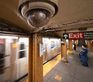 In this Oct. 7, 2020, file photo, a video surveillance camera is installed on the ceiling above a subway platform in the Court Street station in the Brooklyn borough of New York.