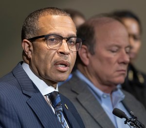 In this Nov. 21, 2019, file photo, Detroit Police Chief James Craig, left, speaks at Detroit Public Safety Headquarters.