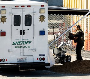 An emergency responder stows a bomb squad robot following a shooting at a Santa Clara Valley Transportation Authority (VTA) rail yard on Wednesday, May 26, 2021, in San Jose, Calif.