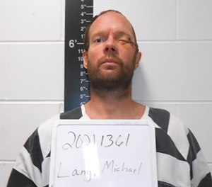 This undated photo provided by the Iowa Department of Public Safety shows Michael Lang.