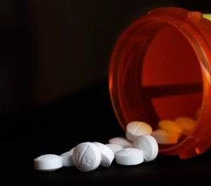 This Aug. 29, 2018, file photo shows an arrangement of Oxycodone pills in New York.
