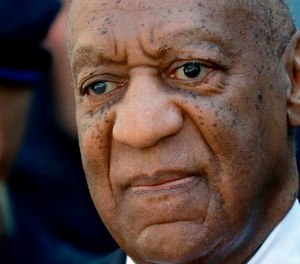 In this April 26, 2018 file photo, actor and comedian Bill Cosby departs the courthouse after he was found guilty in his sexual assault retrial, at the Montgomery County Courthouse in Norristown, Pa.