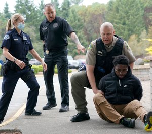 Officers participate in training at the Washington state Criminal Justice Training Commission. Washington state is embarking on a massive experiment in police reform and accountability with nearly a dozen new laws that took effect Sunday, July 25 but law enforcement officials remain uncertain about what they require in how officers might respond – or not respond – to certain situations, including active crime scenes and mental health crises.