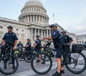 U.S. Capitol Police Mountain Bike officers secure the plaza near the steps of the Capitol in Washington, Thursday, July 29, 2021.