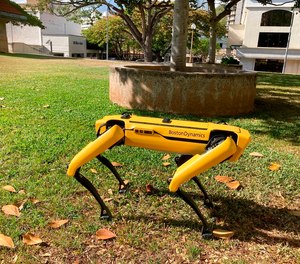 Spot, a robotic Honolulu police dog, stands outside department headquarters during a demonstration to reporters.