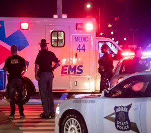 Emergency perssonel respond to the scene of a shooting on Wednesday, Aug. 11, 2021 in Indianapolis.