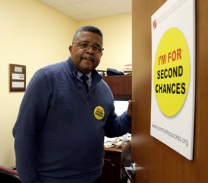 In this Wednesday, Dec. 18, 2019, file photo, Dennis Gaddy, the co-founder of the Raleigh-based Community Success Initiative, is shown at the door to his office in Raleigh, N.C.