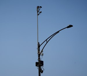 In this Aug. 10, 2021, file photo, ShotSpotter equipment overlooks the intersection of South Stony Island Avenue and East 63rd Street in Chicago.