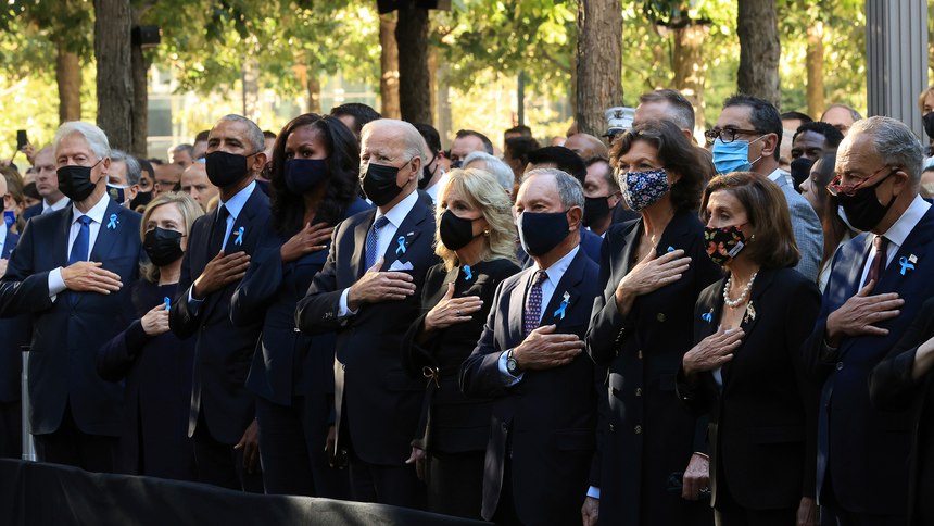 From left, former President Bill Clinton, former First Lady Hillary Clinton, former President Barack Obama, former First Lady Michelle Obama, President Joe Bien, First Lady Jill Biden, former New York City Mayor Michael Bloomberg, Bloomberg's partner Diana Taylor, Speaker of the House Nancy Pelosi (D-CA) and Senate Minority Leader Charles Schumer (D-NY) stand for the national anthem during the annual 9/11 Commemoration Ceremony at the National 9/11 Memorial and Museum on Saturday, Sept. 11, 2021 in New York.