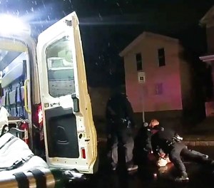 In this image taken from police body camera video, Rochester police officers hold down Daniel Prude on March 23, 2020, in Rochester, N.Y.