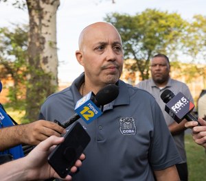 Benny Boscio Jr., the president of the Correction Officers' Benevolent Association, speaks to members of the media at the Rikers Island complex, Monday, Sept. 27, 2021.