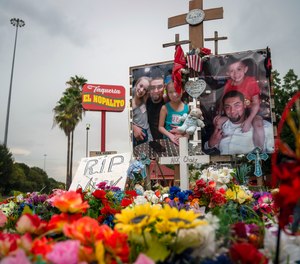 in this Sept. 10, 2020 file photo, a tribute to Nicolas Chavez, 27, who was shot and killed April 21, 2020, by several police officers during a confrontation in Denver Harbor, sits at the site of the shooting along Interstate 10, in Houston.