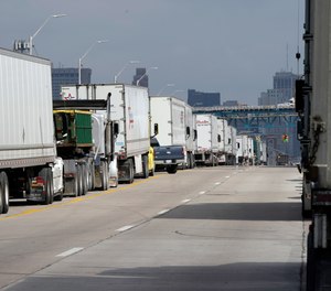 Traffic backs up on Fort St next to the Ambassador Bridge, Monday, Oct. 4, 2021, in Detroit.