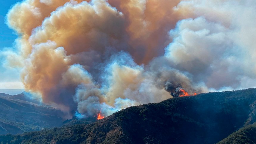 In this photo provided by Santa Barbara County Fire Department, the Alisal Fire continues to burn the dry vegetation in Refugio Canyon on Tuesday morning, Oct. 12, 2021, in Santa Barbara County, Calif.