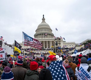 In this Jan. 6, 2021, file photo insurrections loyal to President Donald Trump rally at the U.S. Capitol in Washington.
