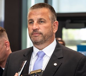In this Aug. 10, 2021, file photo, Fraternal Order of Police Lodge 7 President John Catanzara speaks to reporters at the Leighton Criminal Courthouse in Chicago.
