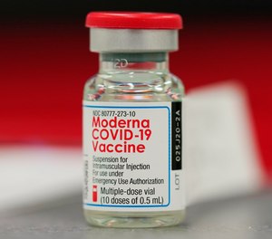 Moderna's booster will be half the dose that's used for the first two shots.