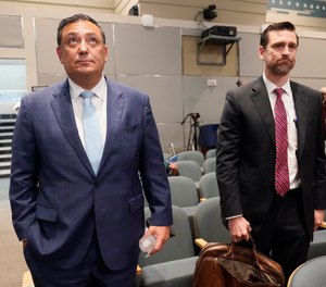 Miami police Chief Art Acevedo and his attorney John R. Byrne, arrive at Miami City Hall for a hearing to determine his job, Thursday, Oct. 14, 2021, in Miami.