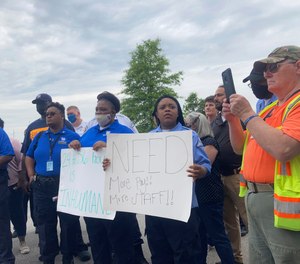 In this June 4, 2021, file photo, employees of the South Carolina Department of Juvenile Justice gather to protest poor working conditions. The acting head of the department Eden Hendrick told legislators on Tuesday, Oct. 20, that she has more vacancies than working correction officers.