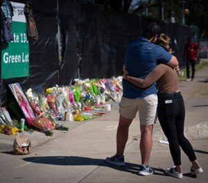 People gather to remember those who died at the fatal Astroworld festival in Houston.