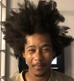 This undated photo shows Perez Deshay Reed, a man suspected in at least six killings over the past two months in the St. Louis and Kansas City areas.