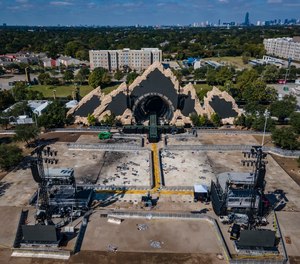 The Astroworld main stage where Travis Scott was performing Friday evening where a surging crowd killed eight people, sits full of debris from the concert, in a parking lot at NRG Center on Monday, Nov. 8, 2021, in Houston.