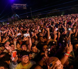 The crowd watches as Travis Scott performs at Astroworld Festival at NRG park on Friday, Nov. 5, 2021 in Houston.