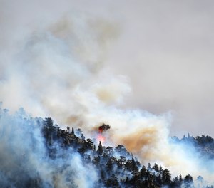 The Kruger Rock fire was burning in Estes Park, Colo. on Tuesday.