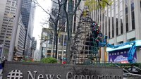 FDNY crews douse giant Christmas tree set ablaze outside Fox News HQ