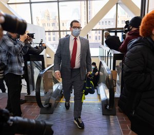 Jeff Storms, attorney for Daunte Wright, arrives at the Hennepin County Government Center in Minneapolis Wednesday, Dec. 8, 2021, as opening statements begin in the trial for former suburban Minneapolis police officer Kim Potter.