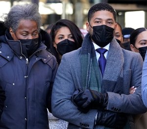 Actor Jussie Smollett, right, departs with his mother Janet, from the Leighton Criminal Courthouse, Wednesday, Dec. 8, 2021, in Chicago, after Cook County Judge James Linn gave the case to jury.