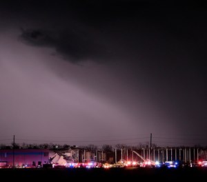 The Amazon distribution center is partially collapsed after being hit by heavy winds on Friday, Dec. 10, 2021 in Edwardsville, IIl.