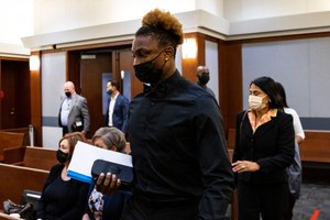 Former Las Vegas Raiders wide receiver Henry Ruggs III arrives at court during his hearing at the Regional Justice Center, on Nov. 22, 2021, in Las Vegas.
