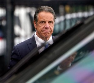 Acting Nassau County District Attorney Joyce Smith said in a statement that an investigation found the allegations against Cuomo “credible, deeply troubling, but not criminal under New York law.”