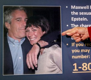 Audrey Strauss, acting U.S. attorney for the Southern District of New York, points to a photo of Jeffrey Epstein and Ghislaine Maxwell, during a news conference in New York on July 2, 2020.