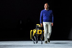 Euisun Chung, chairman of Hyundai Motor Group, takes the stage with the robot Spot from Boston Dynamics during the CES tech show on Jan. 4 in Las Vegas.