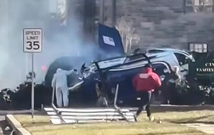 This cellphone video frame grab shows the aftermath of a medical helicopter crash in the Drexel Hill neighborhood of Upper Darby, Pa., in suburban Philadelphia on Tuesday.