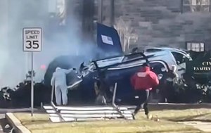 This cellphone video frame grab shows the aftermath of a medical helicopter crash in the Drexel Hill neighborhood of Upper Darby, Pa., in suburban Philadelphia on Tuesday.