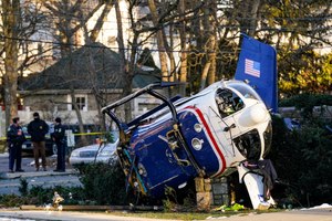 The medical helicopter's four passengers — a 2-month-old baby, nurse, medic, and pilot — survived without life-threatening injuries.