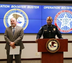 Tulsa Police chief Wendell Franklin announces the break up of a large scale theft ring in Tulsa, Okla., Thursday, Jan. 13, 2022 with U.S. Attorney Clint Johnson (left).