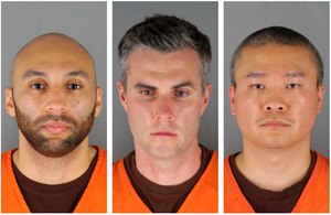 The federal trial for former Minneapolis police officers (from left) J. Kueng, Thomas Lane and Tou Thao is ongoing. A state trial is set for later in the year.
