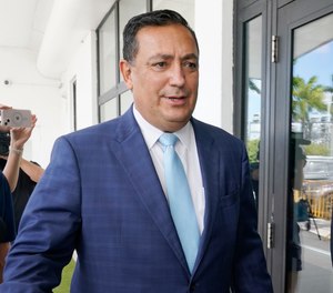 Miami police Chief Art Acevedo arrives at Miami City Hall for a hearing to determine his job, on Oct. 14, 2021, in Miami. Art Acevedo was suspended and then fired after three raucous meetings in which he says he was “purposefully humiliated” and fired for reporting abuses of power by elected officials.