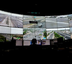 Arizona Department of Transportation Live Traffic Operations operators monitor over 200 freeway camera's throughout the Phoenix Metro area, Sept. 10, 2015 in Phoenix.
